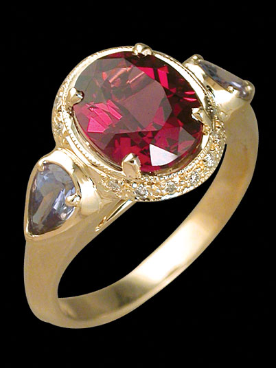 c1709 oval claw rhodolite garnet ring pear tanzanite diamond ring