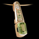 P1549 Yellow gold Barrell Peridot and diamond pendant